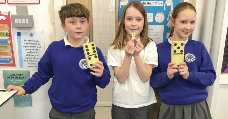 JJ, Nichole and Elizabeth explore the domino effect.