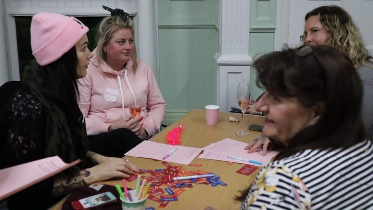 Some of the attendees wearing pink.
