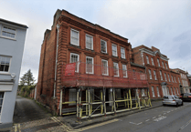 Repairs on town centre building behind scaffolding for years to begin
