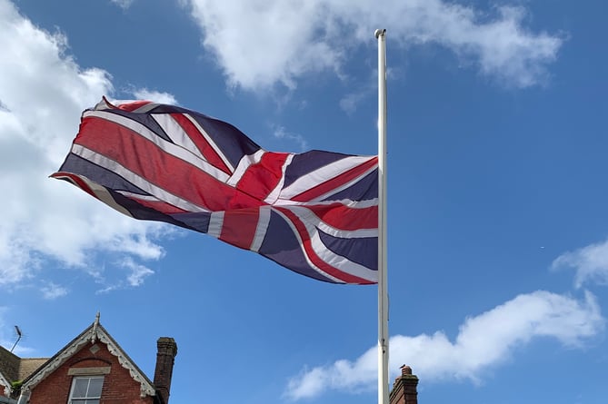 The Union flag is flying at half mast outside Haslemere town hall in a mark of respect to Councillor Geoff Whitby who has died after a short illness