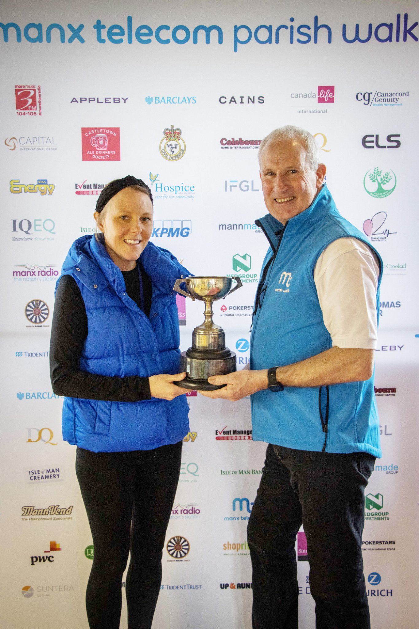 Parish Walk 2022 Ladies Winner Sammy Bowden with race director Ray Cox
