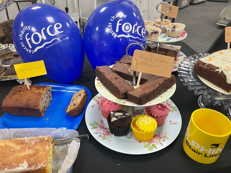 At the Bake Sale at Dolphin Stairlifts and Mobility Solutions.
AQ 6554