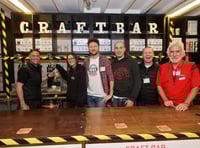 <p>Lee Moran from Beerex sponsors Moran Roofing and partner Cresta-lea Brown (left) pour the first pint at Beerex’s new Craft Bar on opening night</p>