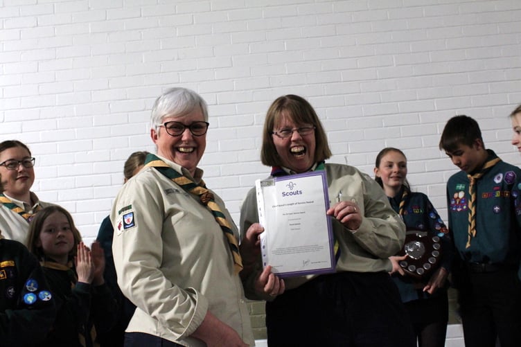 Karen Garton receives the long service award for 20 years from Helen Derbyshire. SR 7451