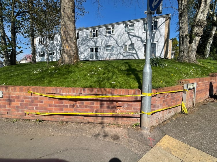 The smashed wall after the car was removed on April 21. AQ 6868