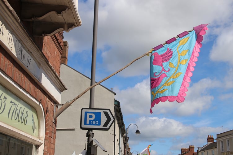 Flags in Crediton High Street by Alan Quick