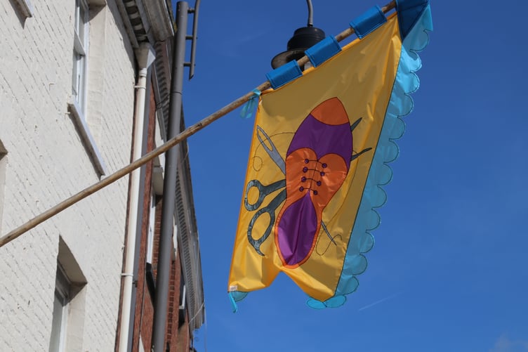Flags in Crediton High Street by Alan Quick