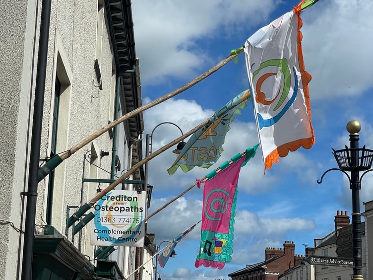 Flags in Crediton High Street by Alan Quick