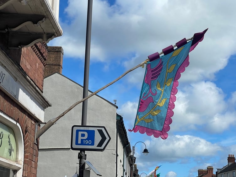 Flags in Crediton High Street by Alan Quick
