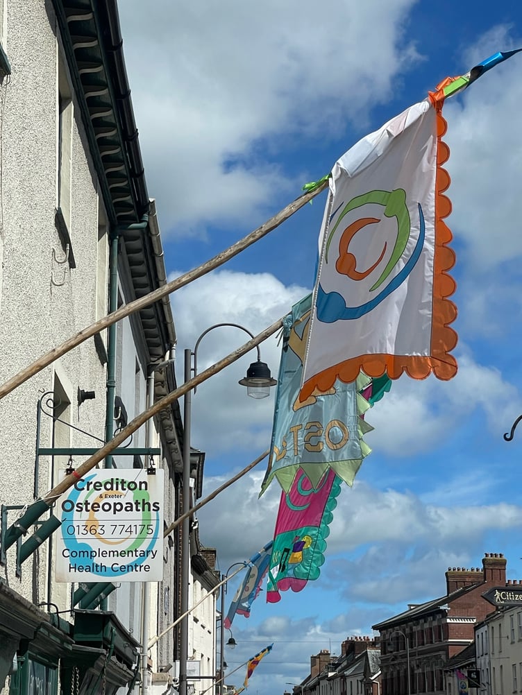 Flags in Crediton High Street by Alan Quick