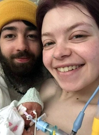 Courtney and Sam Harvey with little Melanie (below) who was only 493g at birth