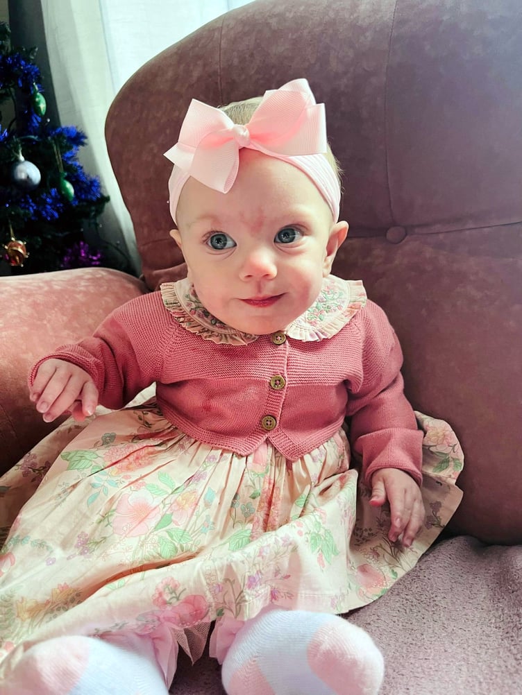 Melanie is now one and is thriving. See SWNS story SWFTpoison. A woman whose unborn child was being "poisoned" in her womb arrived at just 23 weeks- weighing less than a can of beans. Courtney Harvey, 21, was devastated when medics gave her baby- who weighed just 493g- a 10% chance of survival. But Courtney's little girl, one-year-old Melanie Harvey, is now thriving.