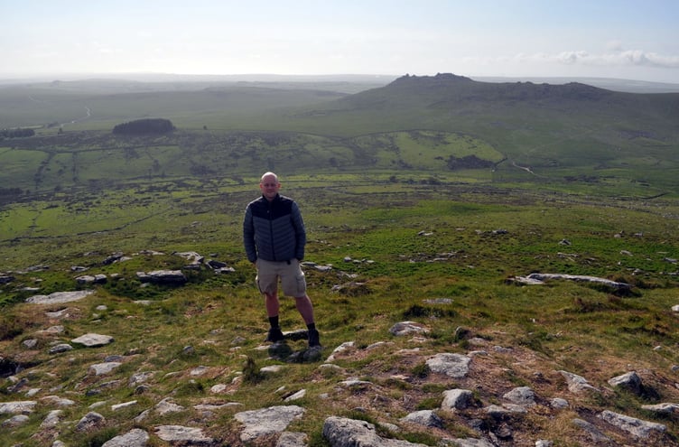 Cornish travel writer Tim Hannigan at the summit of Brown Willy during the 300-mile walk described in The Granite Kingdom.