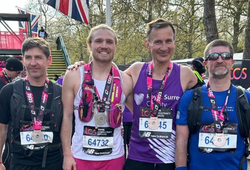 <p>MP Jeremy Hunt is joined at the finish line of his second London Marathon in six months by friends of his brother Charlie's who were all raising money for Sarcoma UK</p>