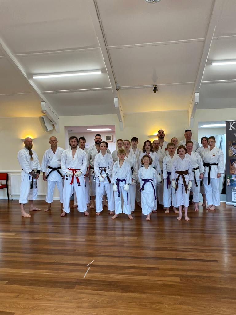 MAIN: The successful black belt candidates. At the front from left to right: Luceanne Belton, Charlotte Hawkes, Patrick Wills. RIGHT: The squad training group.