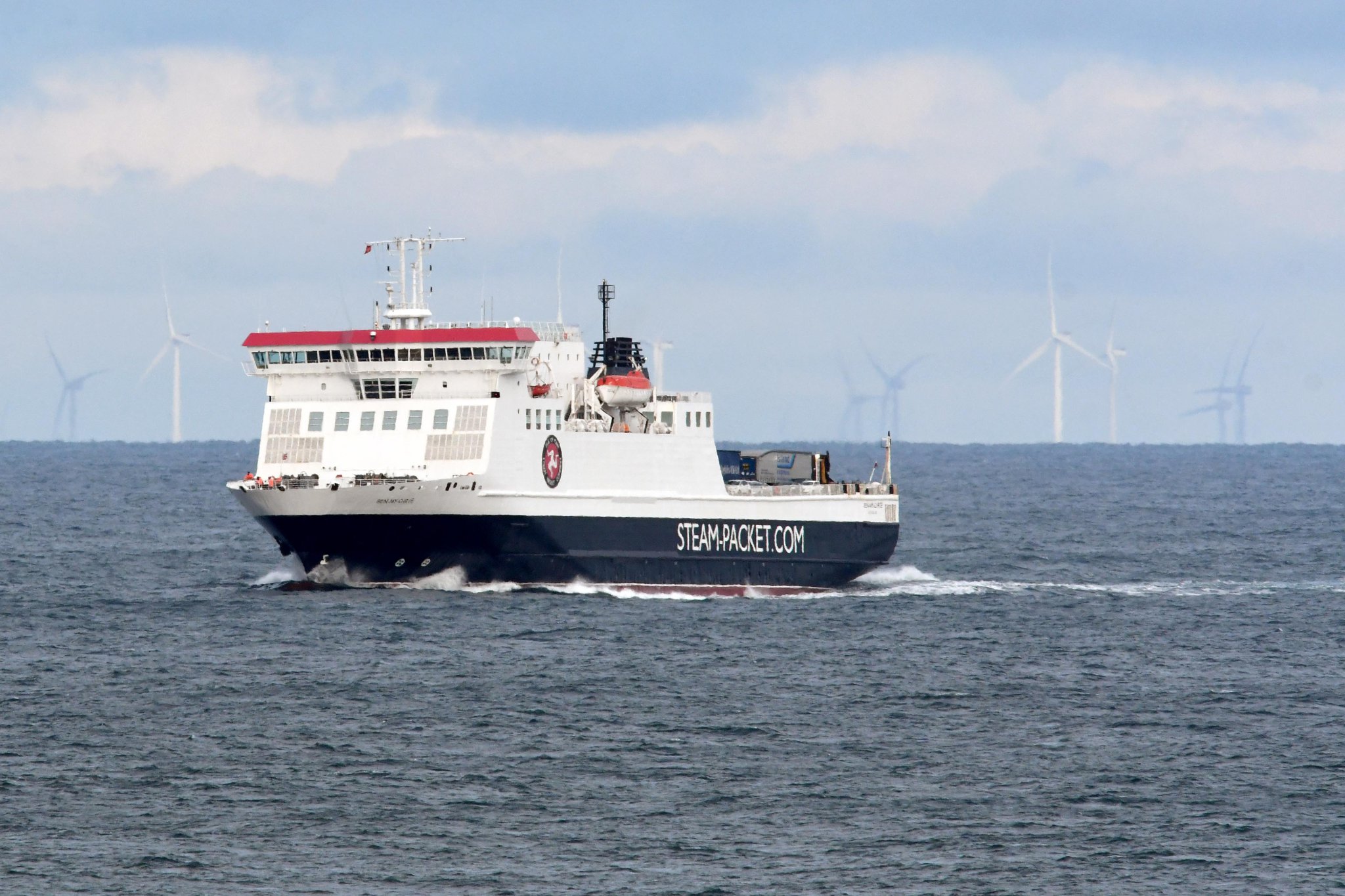 Isle of Man Steam Packet Company vessel Ben My Chree with offshore wind turbines in the background