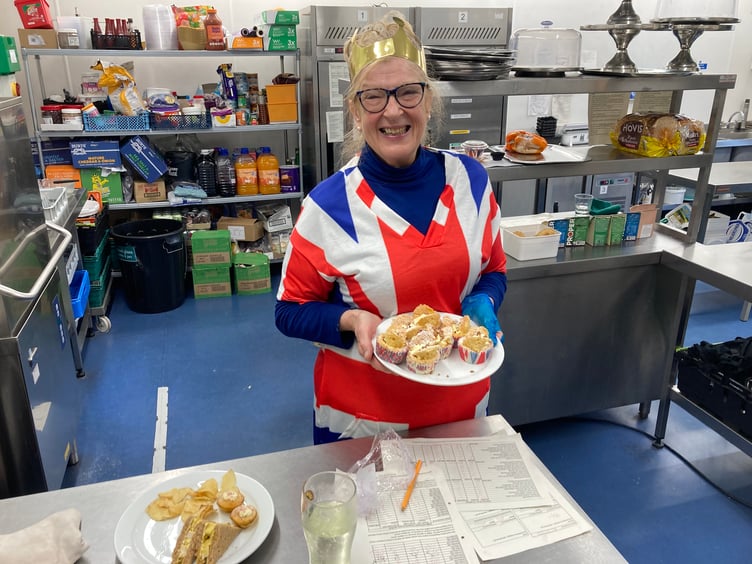 Vicky Chalmers preparing the cakes and scones at The Watermark in Ivybridge