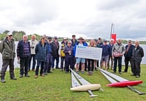 Frensham RC sailors negotiated choppy waters to deliver charity cheque