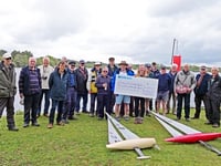 Frensham RC sailors negotiated choppy waters to deliver charity cheque