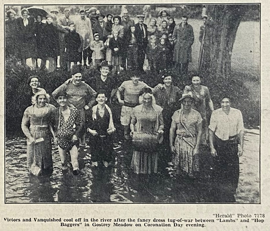 Victors and the vanquished cool off in the River Wey after a fancy dress tug-of-war between ‘Lambs’ and ‘Hop Baggers’ in Gostrey Meadow on Coronation Day evening, 1953