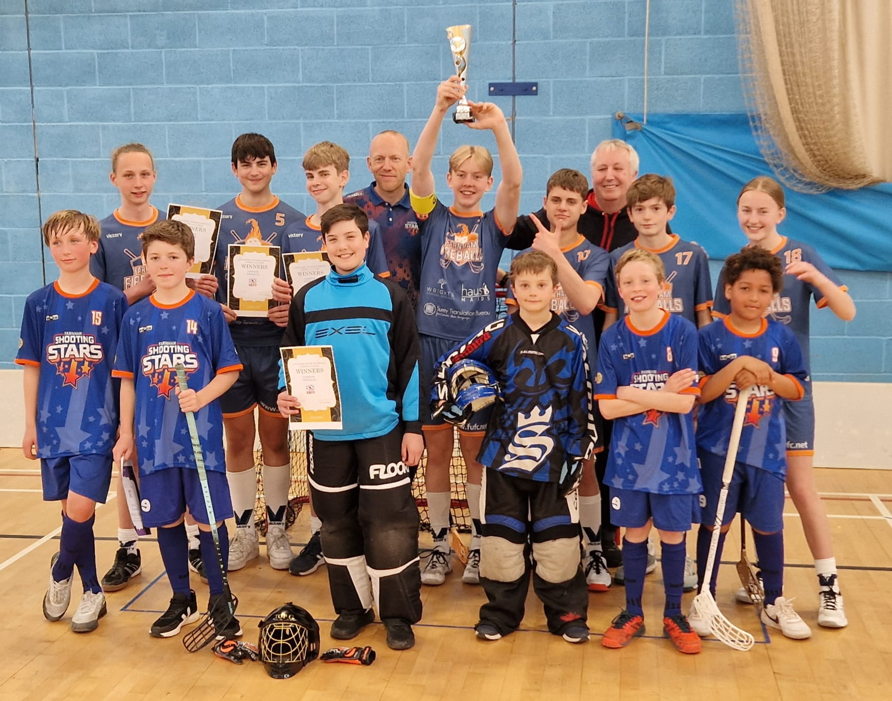 Farnham under-16 Fireballs celebrate their league title victory with the under-13 Shooting Stars