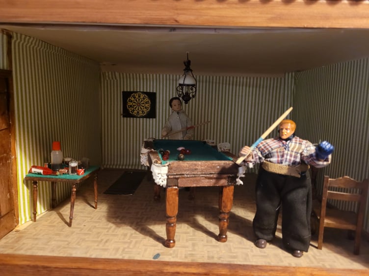 Hazel's model pub The White Rabbit comes with a games room, complete with snooker, darts and dice