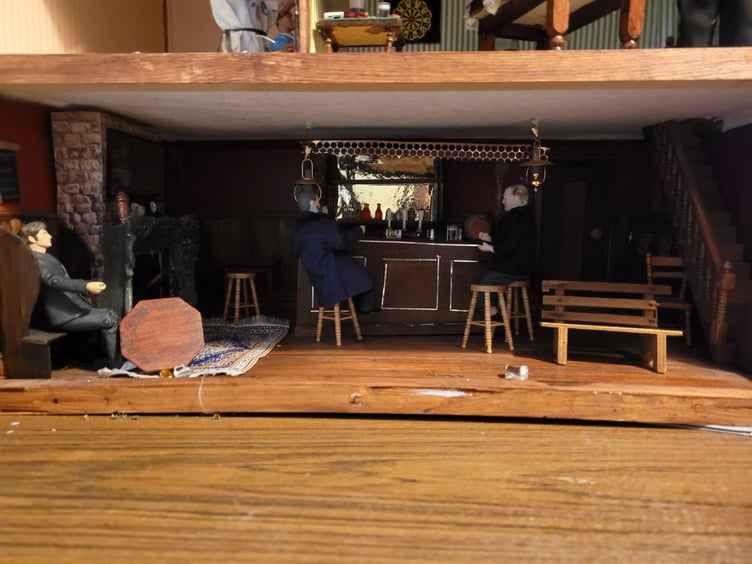 The bar area of Hazel's model pub The White Rabbit