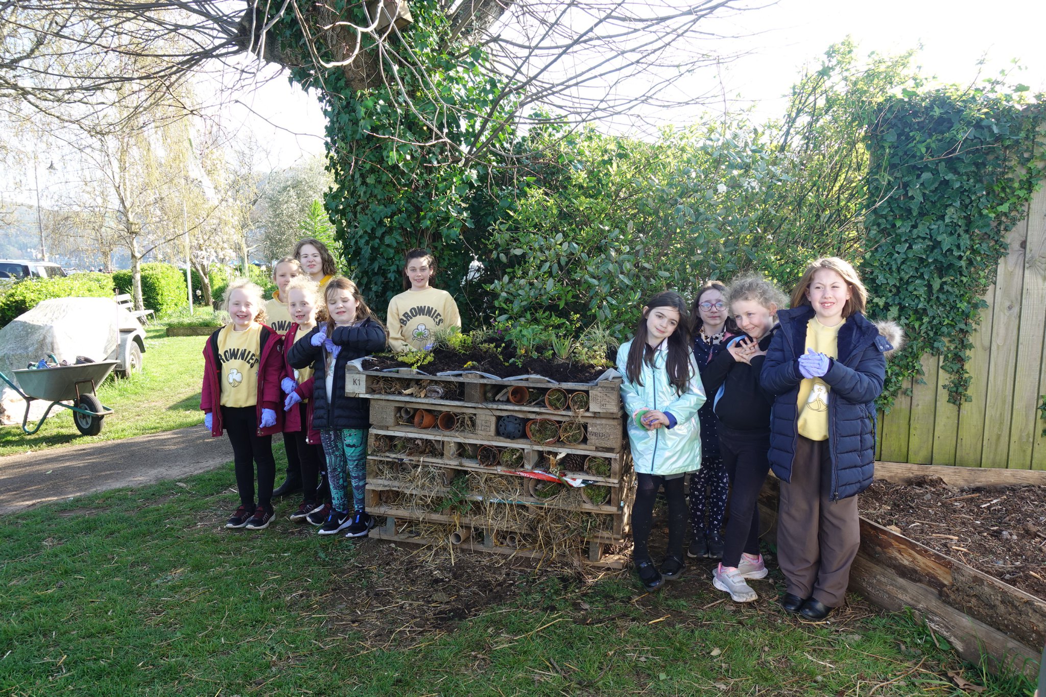 Dartmouth Brownies building their ‘bug hotel’ and community volunteers planting flowerbeds
