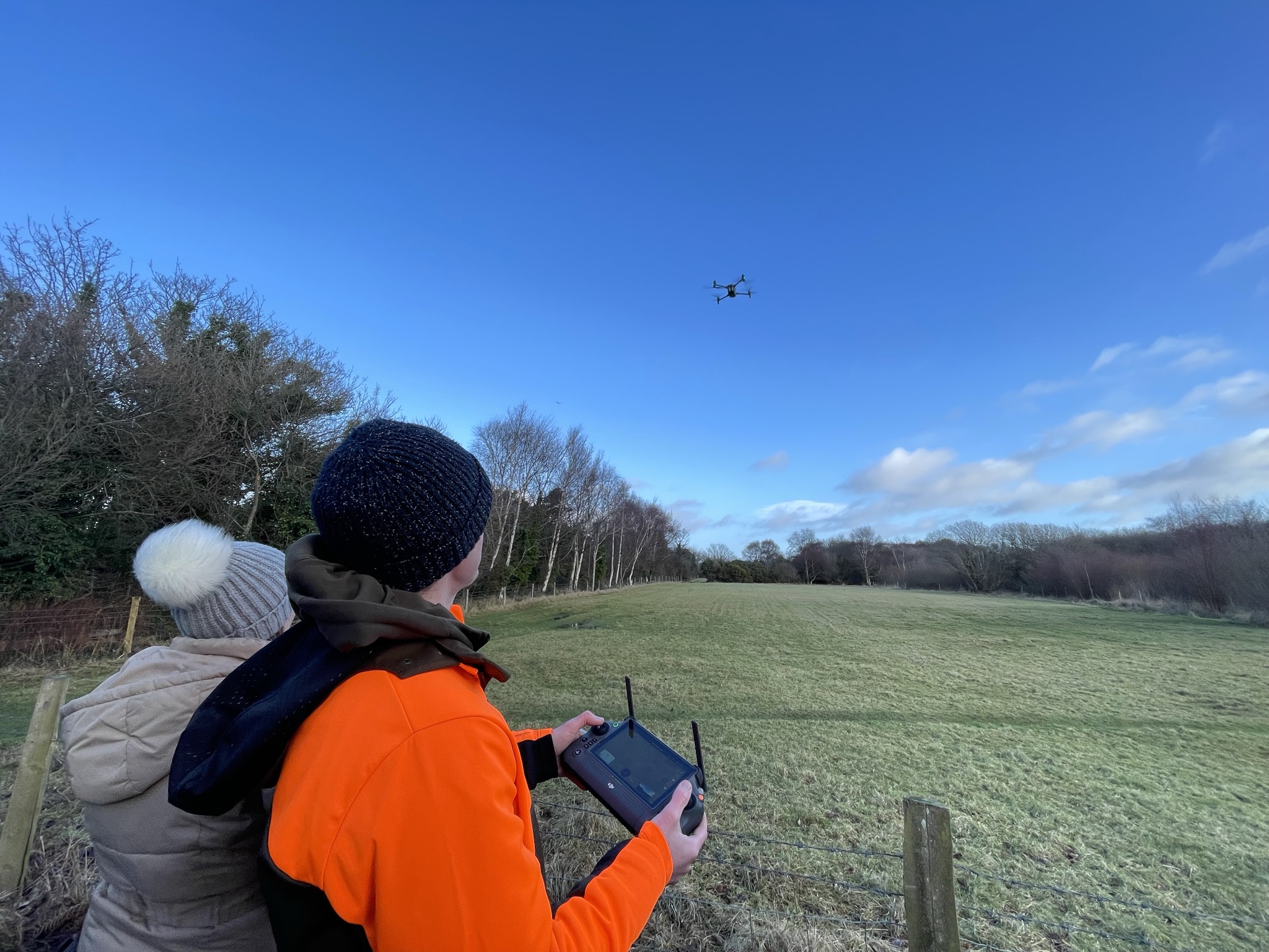 Ben Harrower controlling the drone with a thermal imaging camera attached in the Curraghs