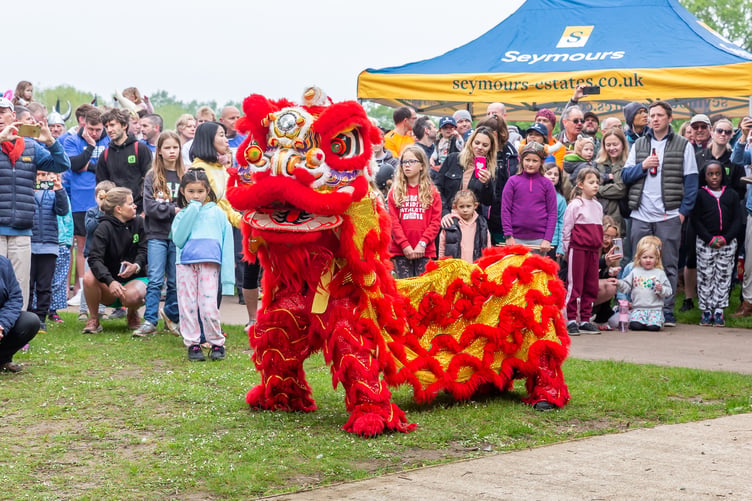 Members of the Chinese Association of Woking captivated the crowds with a colourful dance as part of a Dragon Awakening ceremony.