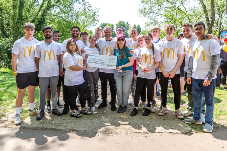 The McDonald's team presented a cheque for £5,500 to the charity.