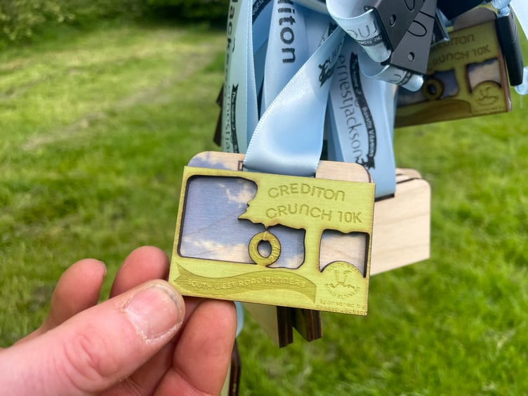 One of the wooden medals. AQ 8747