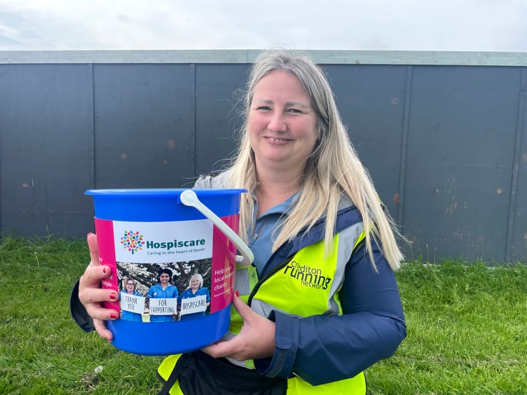 Rebecca Warren from Ernest Jackson Ltd with one of the Hospiscare charity collection buckets. AQ 8754