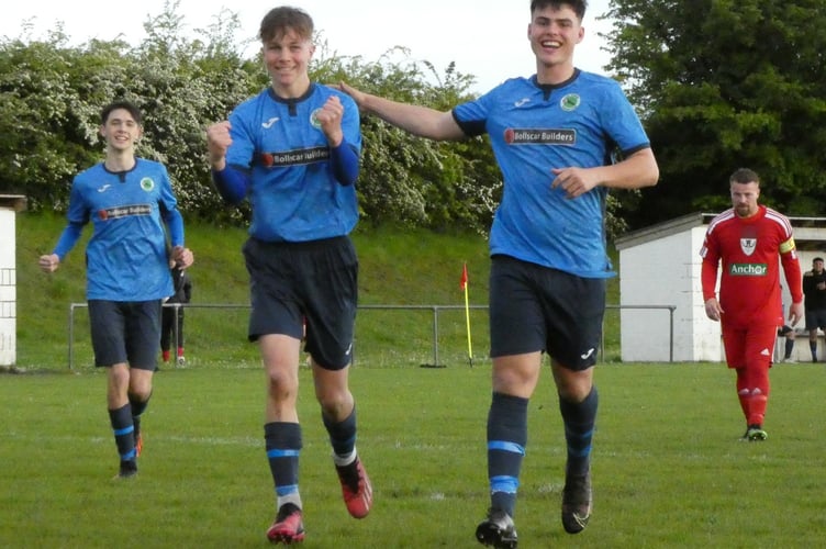 Theo Glazier celebrates