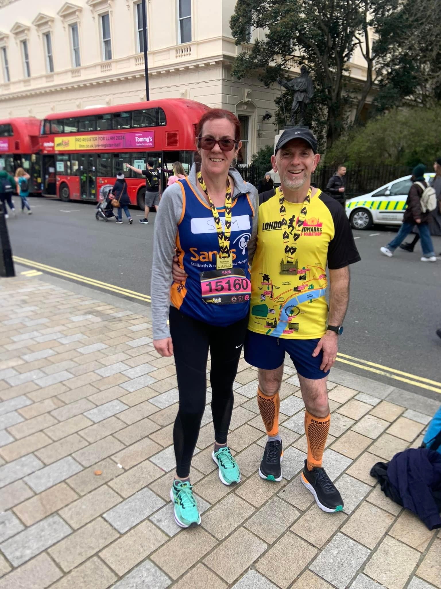 A beaming Charlotte Finden proudly shows off her Brighton Marathon medal