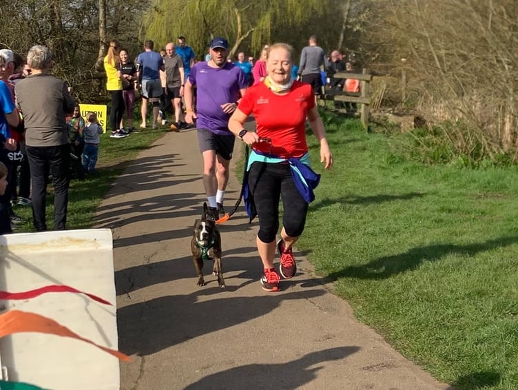 Karen Sinclair and Maisie near the finish line at Moors Valley parkrun