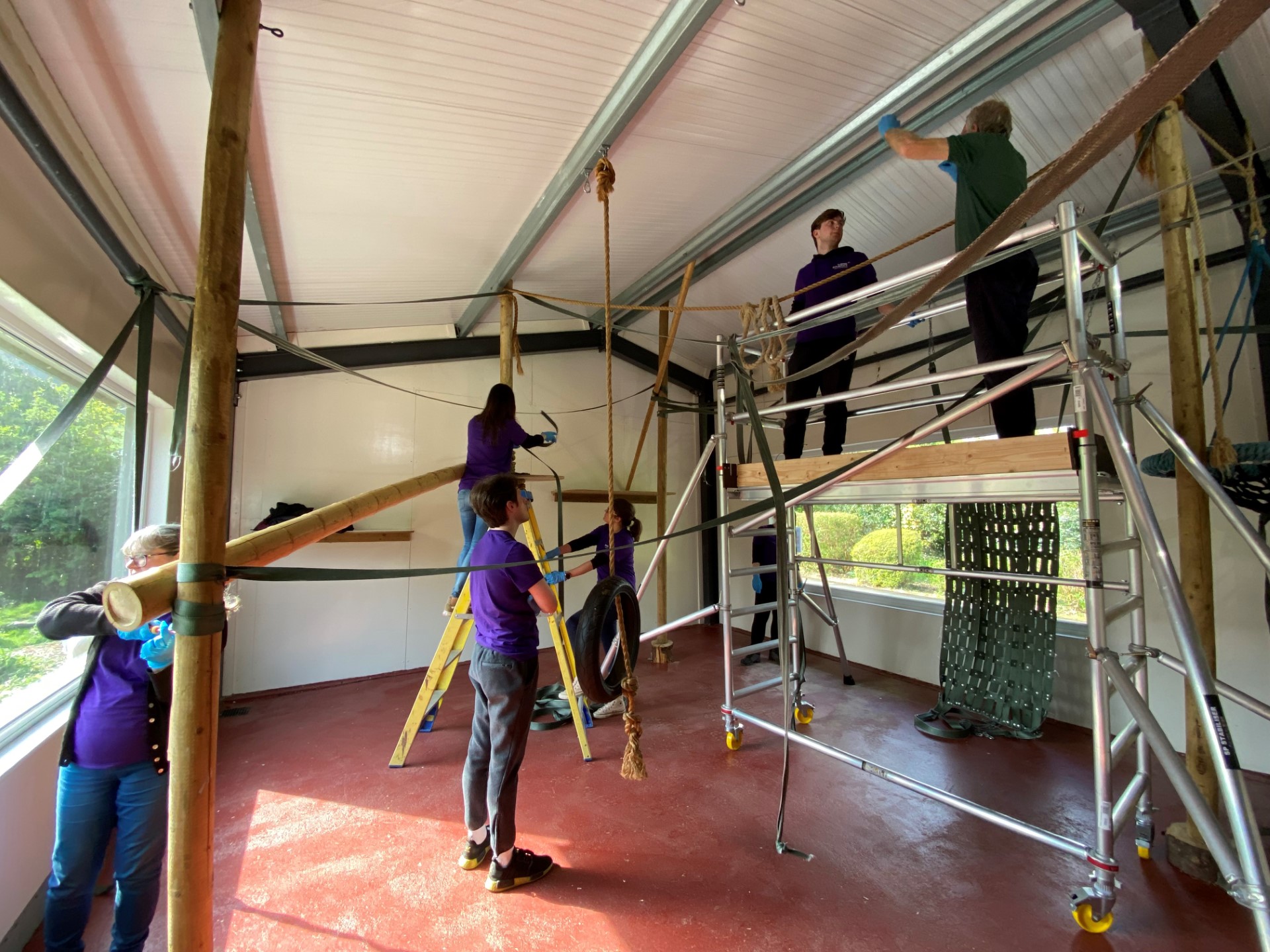 Members of Tower Insurance Group in the Silvery Gibbon family enclosure at Curragh's Wildlife Park