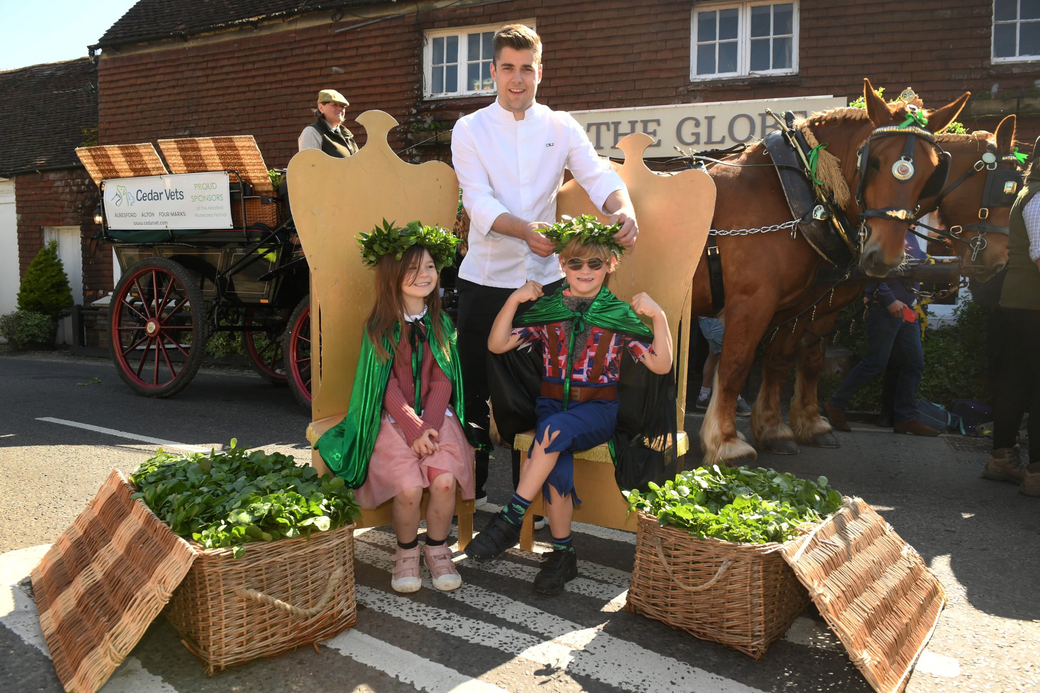 Masterchef Charles Jeffery crowns the Watercress King & Queen, Beau Reilly-Taylor and Jack Sims before the procession