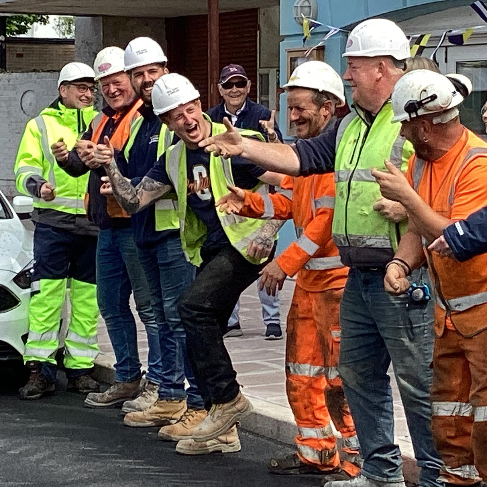 A pilates class involving contractors on Peel Quay
