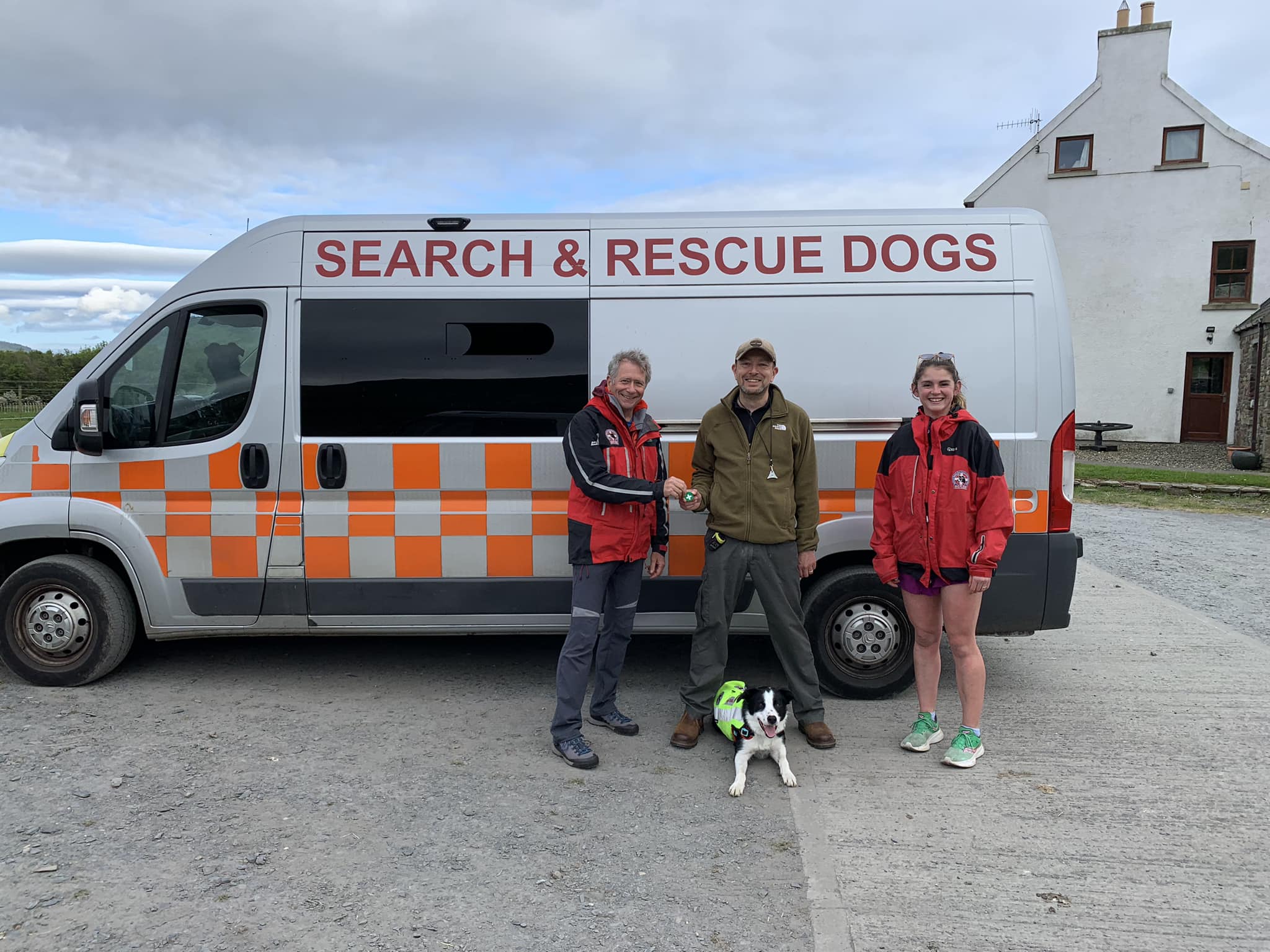 Jim MacGregor, Jeremy Theobald, Olivia Crowe and trainee dog Obi