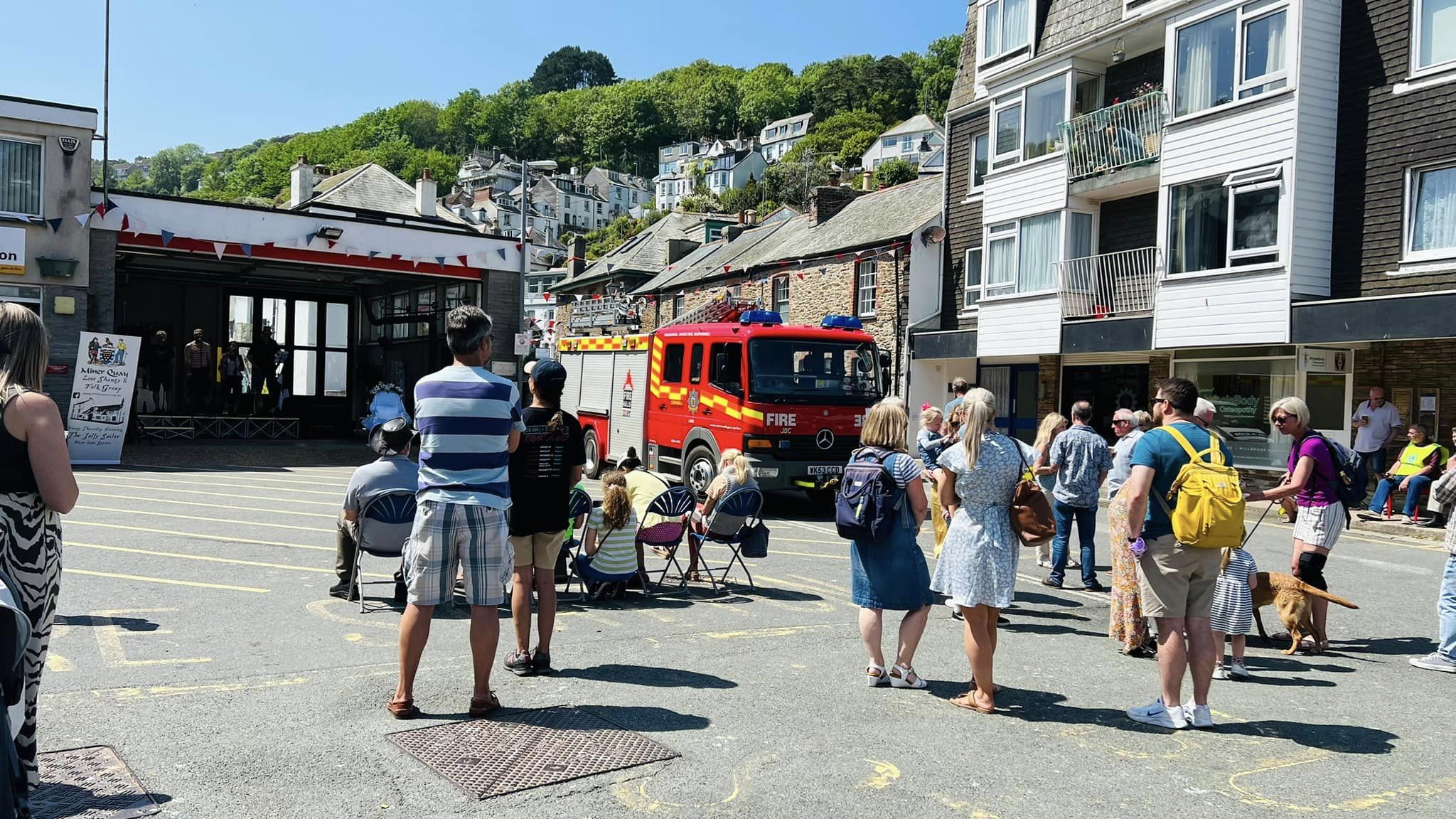 There were plenty of games and live music performances to keep everyone entertained while the traditional May Pole (above, left) was erected ahead of the dance