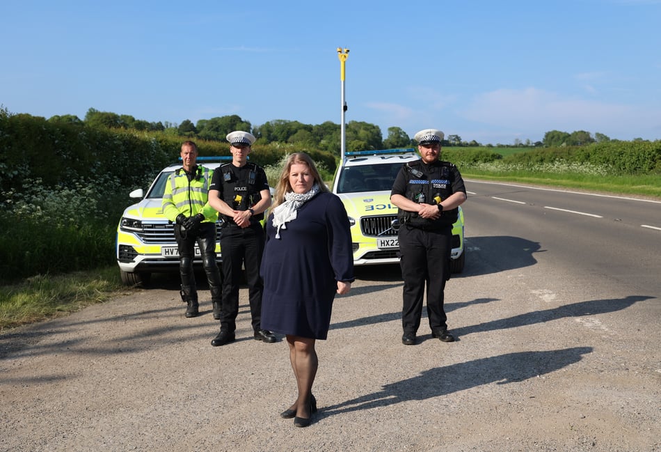 <p>PCC Donna Jones in front of one of the new average speed cameras and officers in the Roads Policing Unit on the A32 West Meon. From left to right – Inspector Andy Tester and PC Owen Athersuch, PCC Donna Jones, PC Aaron Bendall</p>