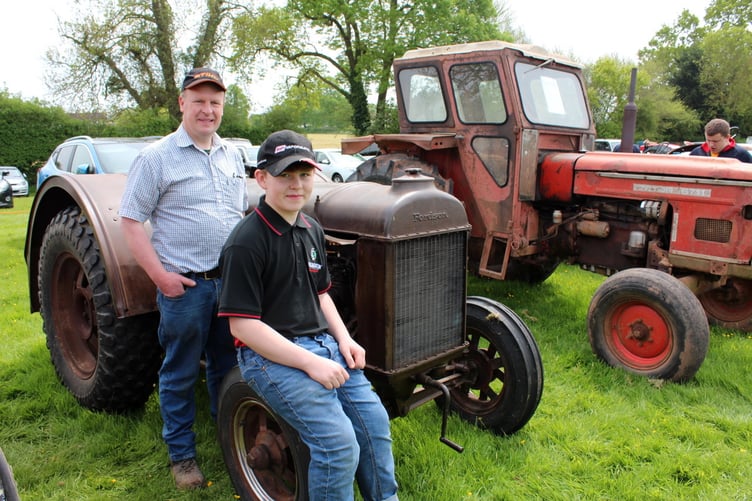Edwin Walling (13) and his father Tom with the Fordson F which the family has had for about three years. SR 7844