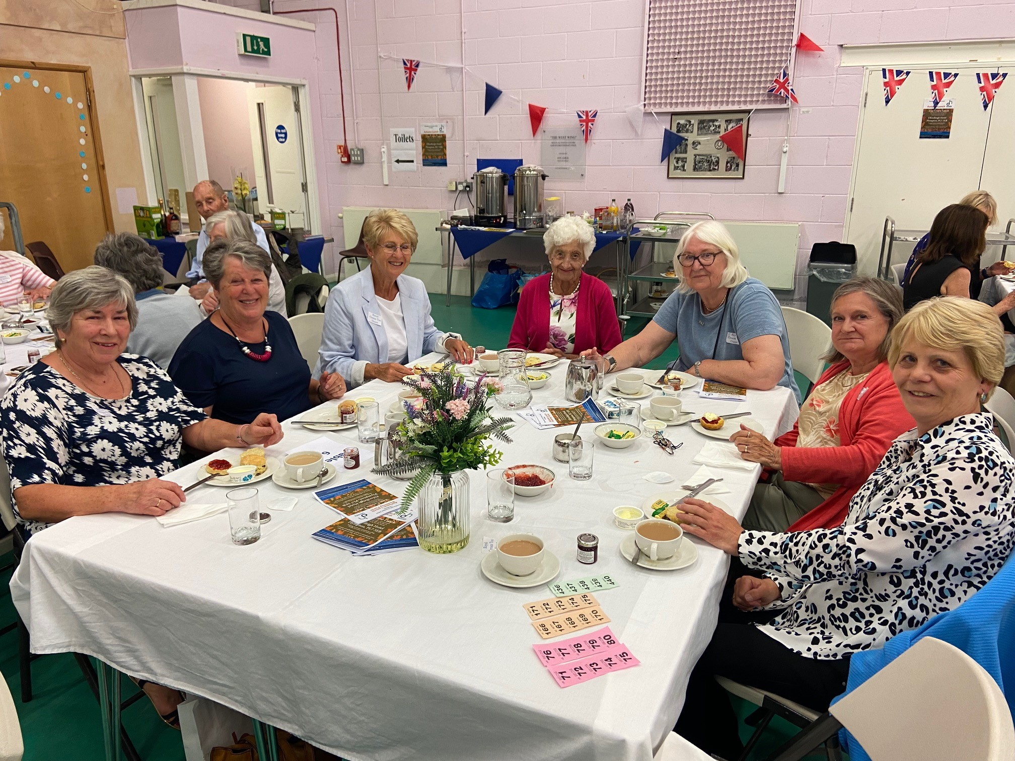 ABOVE: Guests enjoying their cream tea.
BELOW: Debbie Lumsdon with members of the Dame Hannahs Ivybridge Supporter Group.
BOTTOM: Debbie with Meg de Blank.