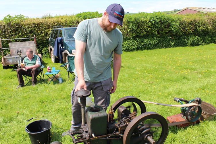 Jack French of Cheriton Fitzpaine with his 1917 stationary Bradford which has been in the family for more than 45 years. It was used to drive the water at the Whiteway cider factory at Whimple. SR 7869