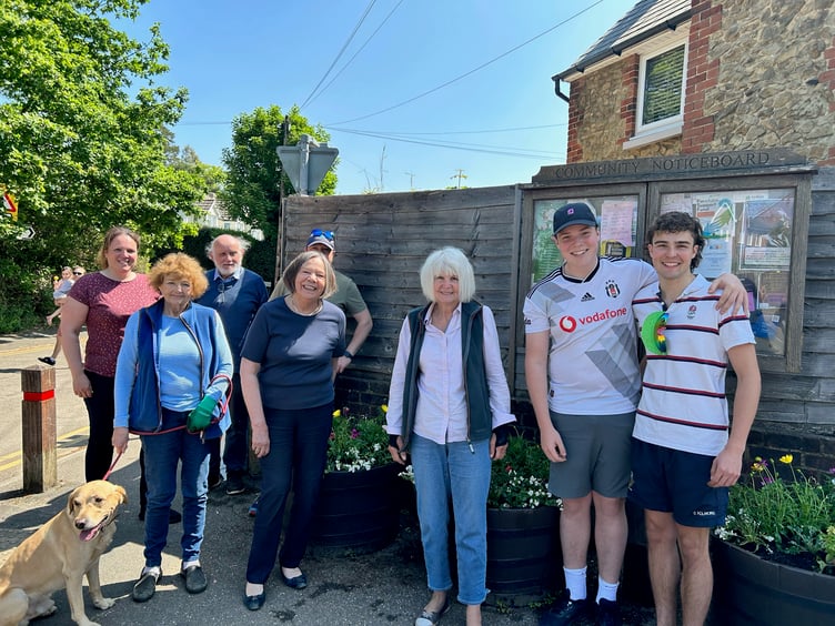 The Bourne Crossroads have been ‘beautified’ once again thanks to the efforts of a committed band of villagers
