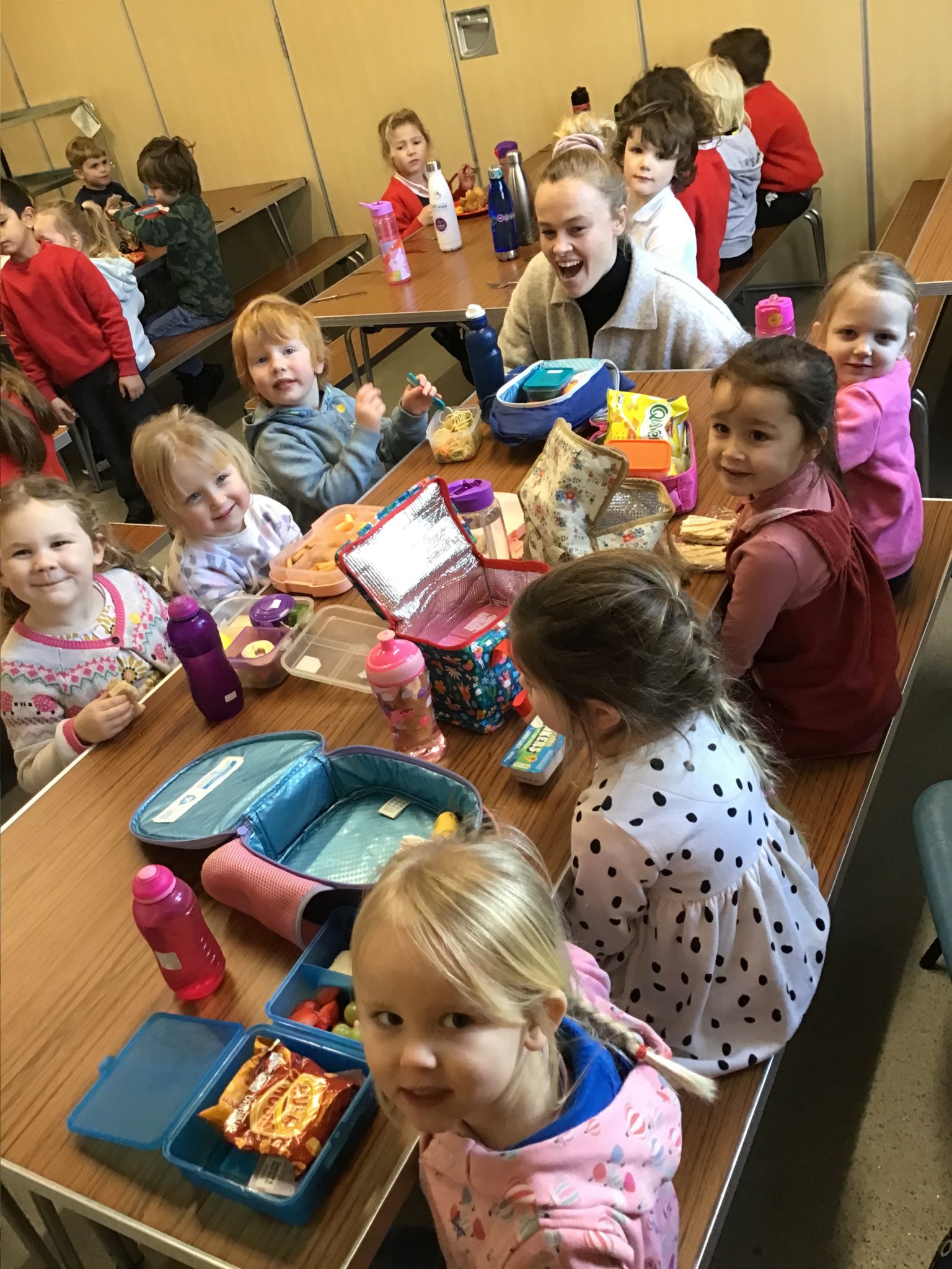 Pictures show the school children, Maypole dancing and, below, the Pre School and celebrating a ‘Good’ Oftsed report