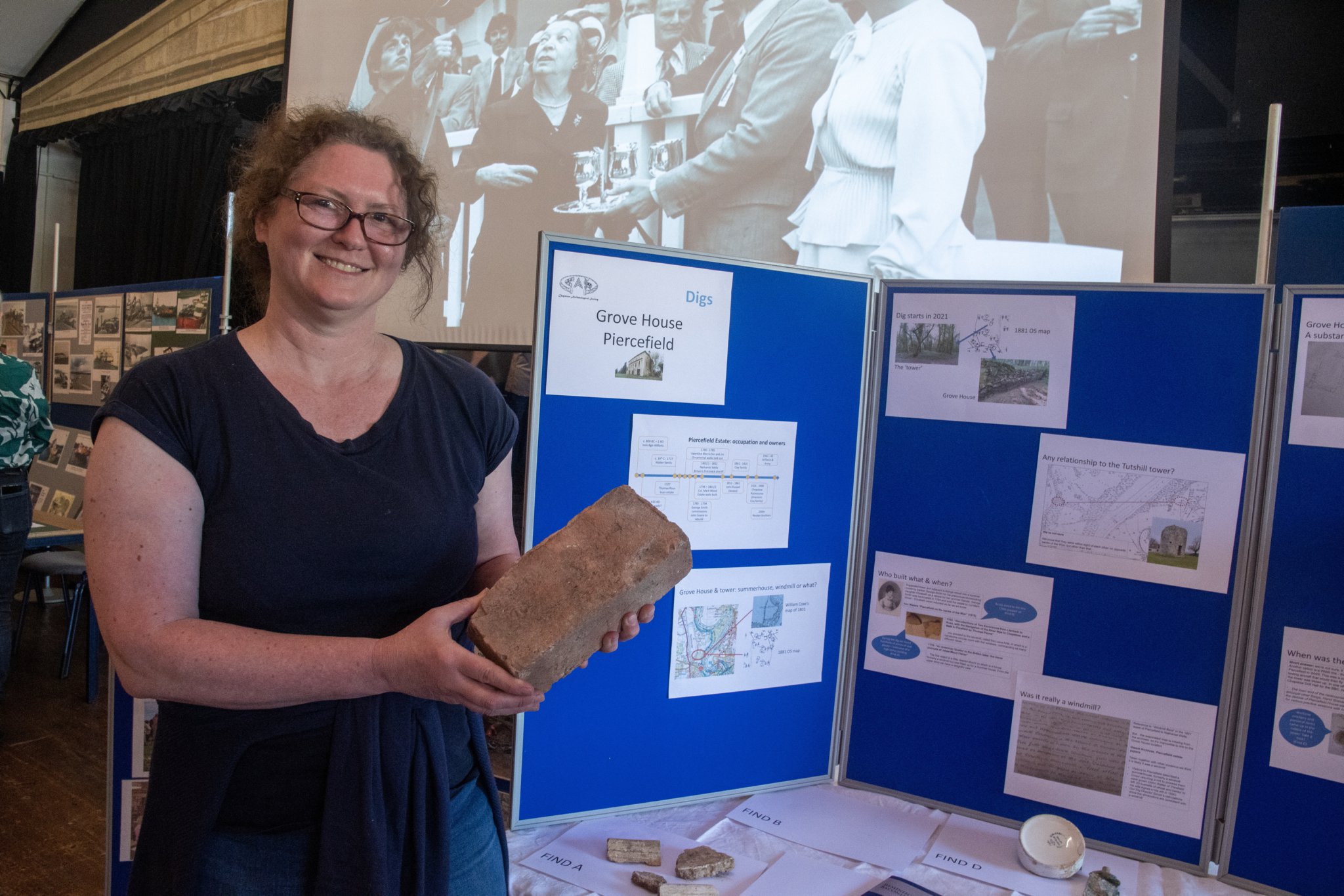 Lynne Feakes of Chepstow Archaelogical Society who are conducting a dig at Grove House and tower in the grounds of Piercefield House. The size of the brick has helped date the building.