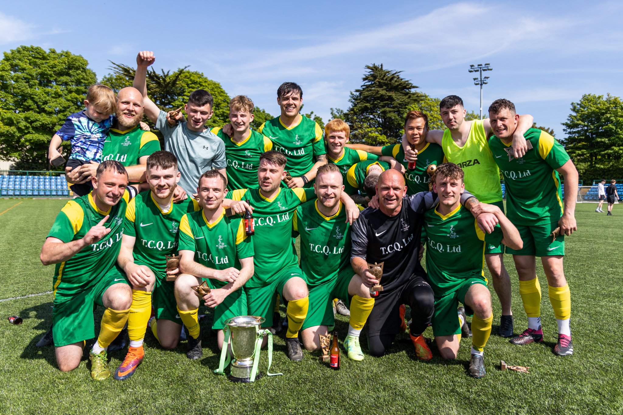 St Mary’s players celebrate with the Paul Henry Gold Cup after beating Braddan 4-2 in the weekend’s final at the Bowl. The victory wrapped up a superb season for the Saints who also won the DPS Division Two title and the GH Corlett Woods Cup (Photo: Gary Weightman)