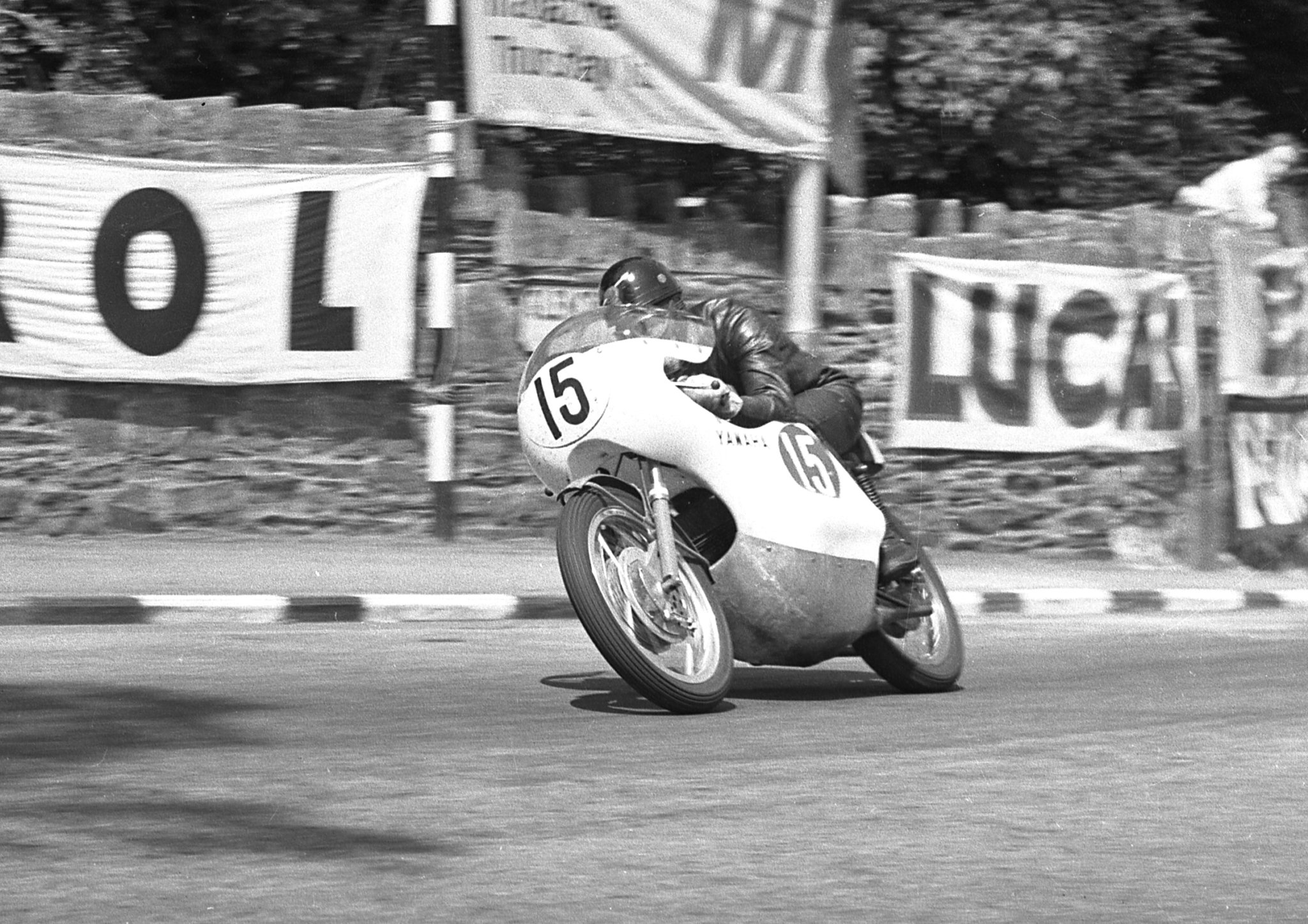 Tony Godfrey (Yamaha) leaves Governors Bridge: 1963 Lightweight TT. Godfrey crashed at Milntown during this race; he was the first riders to be helicoptered to hospital